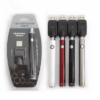 Vape pen set with four colors and USB charger in packaging.
