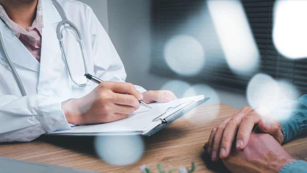 A doctor writing a note image. medium image